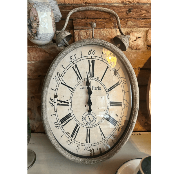 Orologio in metallo ovale Nuvole di Stoffa